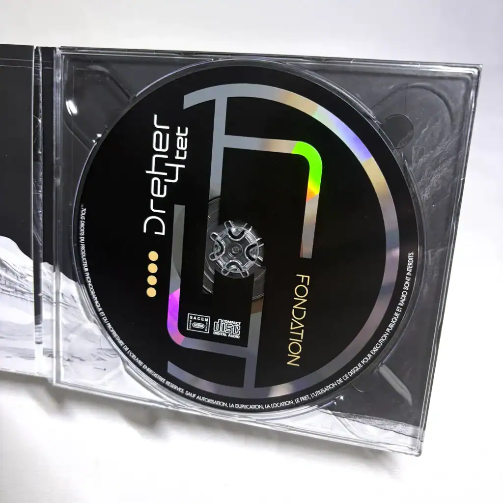 Guide des supports physiques : Bien choisir son packaging CD 20 Rondelle Cd pour Dreher 4tet « Fondation » — Graphisme FKWeb